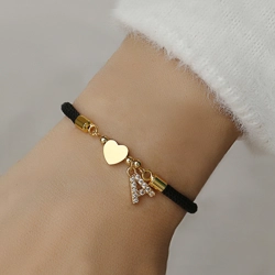 Simple bracelet with heart pendant and zircon letter charm