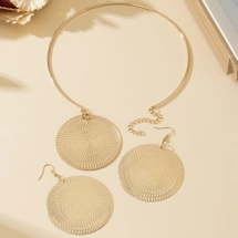 Geometric disc necklace..