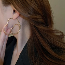 Double heart hoop earri..