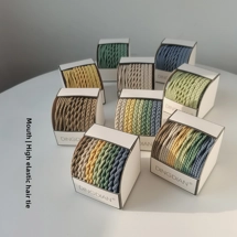 Boxes of hair ties - 8,..