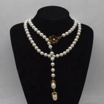 Long artificial pearl n..