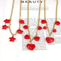 Chain necklace with charms -..