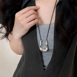 Twisted rope necklace with U shaped pendant