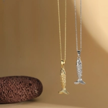 Necklace with fish pend..