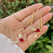 Zircon bird necklace an..