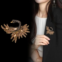 Retro style bird brooch