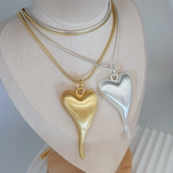 Warped heart necklace