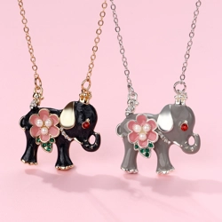 Sweet elephant necklace with flower detail