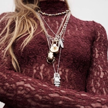 Triple layer necklace with insect & fish pendants