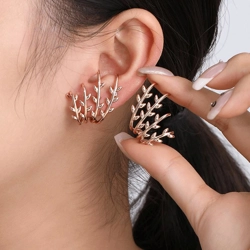 Asymmetrical leaf design ear studs