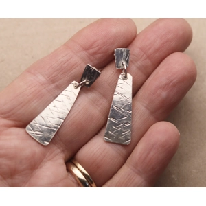 Silver criss cross geometric earrings