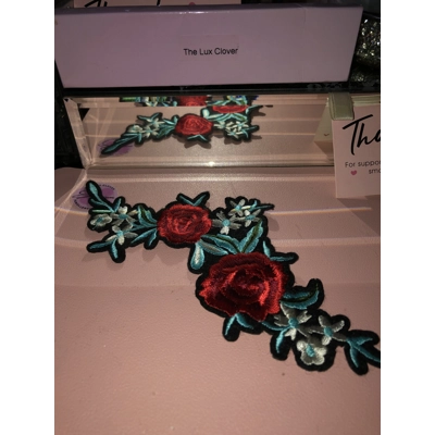 Floral rose stitch on fabric patch Floral rose stitch on fabric patch