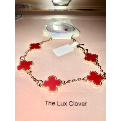 Ladies Gold and red clover bracelet Ladies Gold and red clover bracelet