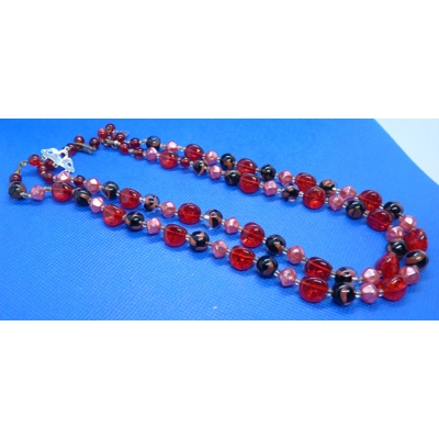 Red marble double strand necklace. Red marble double strand necklace.