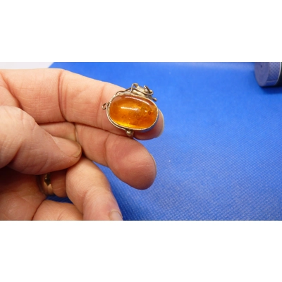 Amber and silver ring