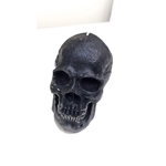 Big Decorative Pillar Candle Skull Old Rock On the Pathway Gray