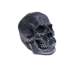 Big Decorative Pillar Candle Skull Old Rock On the Pathway Gray