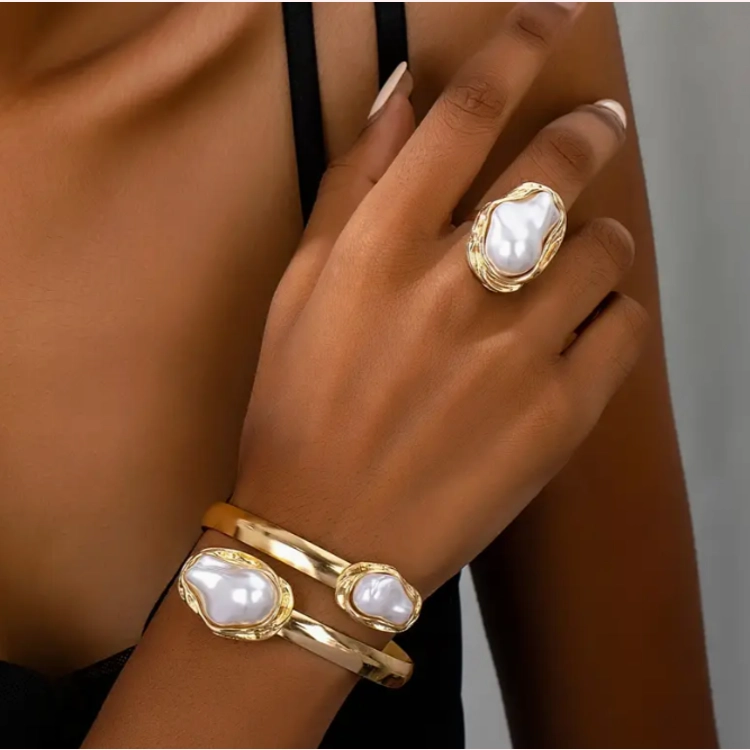 A Pearl Open Hand Bracelet a..