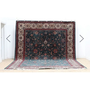 Kashan carpet foliate and floral motifs to a dark green ground 302 x 385cm Kashan carpet foliate and floral motifs to a dark green ground 302 x 385cm