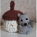 Tiny Grey Squirrel In An Acorn