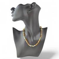 Raw amber necklace with gemstones..