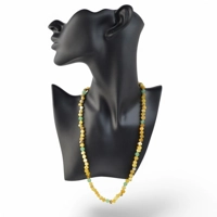 Raw amber necklace with gemstones..